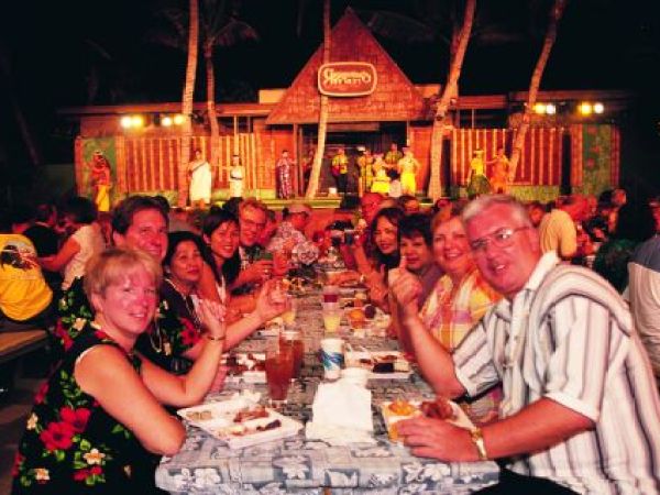 a group of people sitting at a table