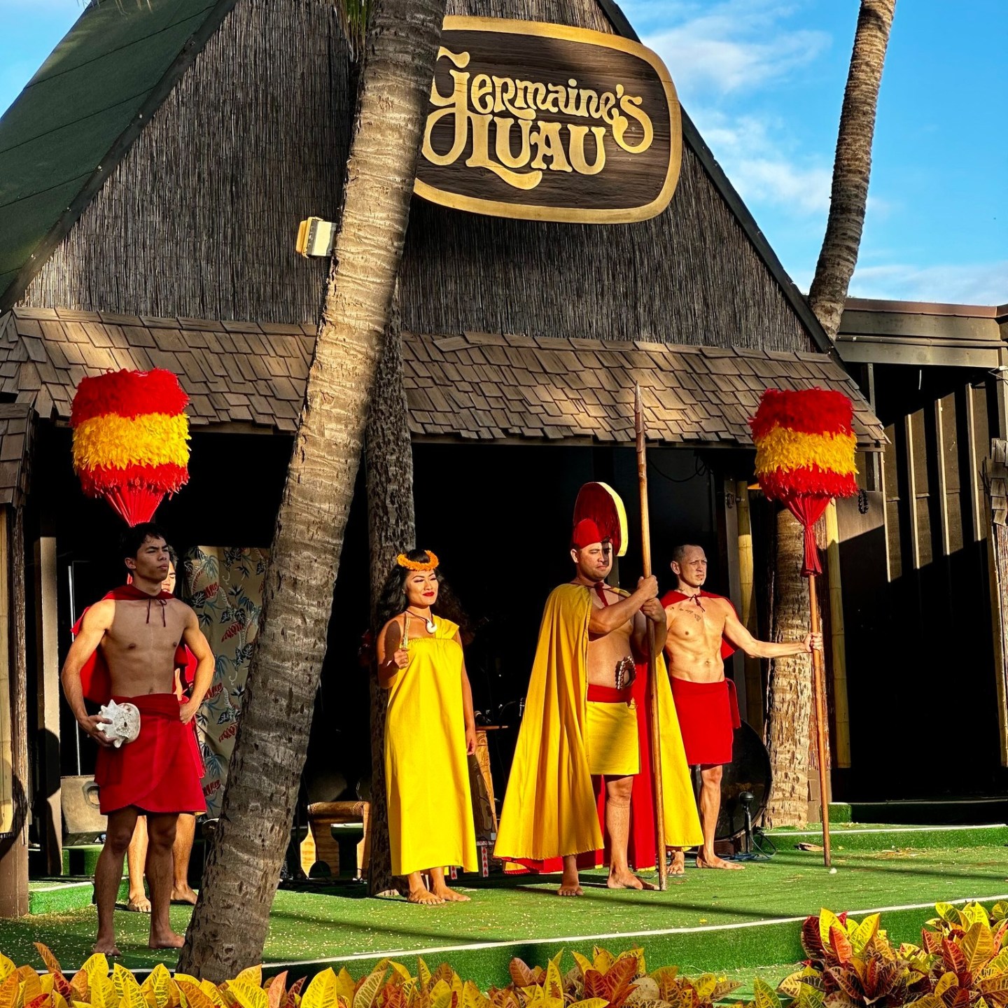 a group of people standing in front of a building