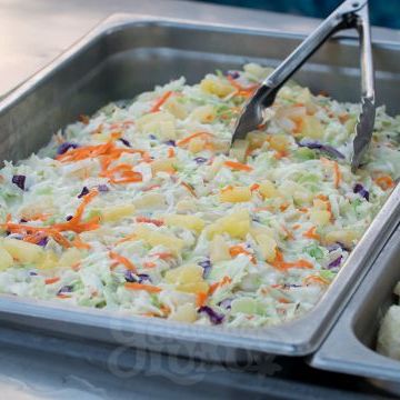a tray of food with rice and vegetables
